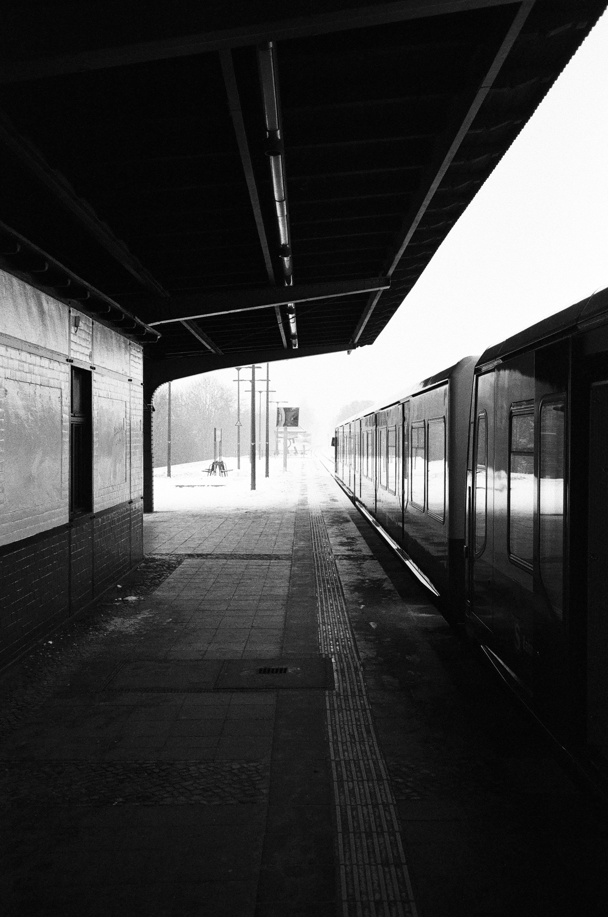 an S-bahn station in berlin covered in snow